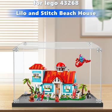 LEGO Lilo and Stitch Beach House set 43268 displayed in clear protective case on wooden table