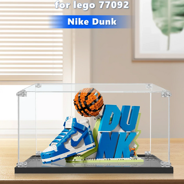 LEGO model of blue and white Nike Dunk sneaker with basketball and DUNK letters in clear display case