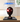LEGO Marvel Miles Morales' Mask set 76329 displayed in a clear protective case on a wooden table