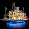 Illuminated detailed LEGO riverboat model on blue-lit stand with smokestacks and paddlewheel