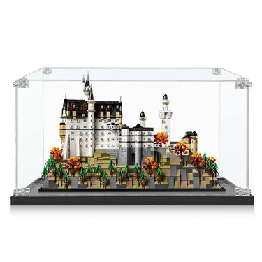 Detailed LEGO Neuschwanstein Castle model with autumn trees in clear display case