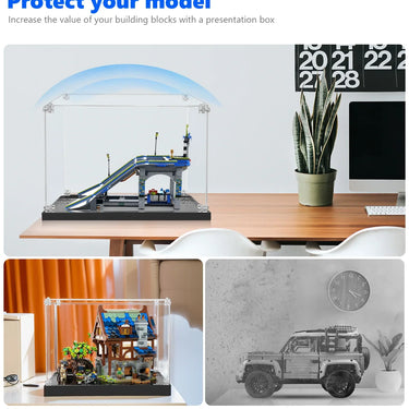 Clear display boxes protecting model building sets from dust and collisions on desks
