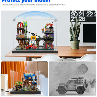LEGO building sets displayed in clear dustproof cases on wooden desks, protecting models from dust
