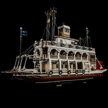 Detailed LEGO model of a vintage river paddle steamboat named Amelia with smokestacks and intricate balcony
