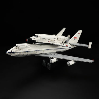 LEGO model of NASA space shuttle Enterprise atop a Boeing 747 Shuttle Carrier Aircraft on black background