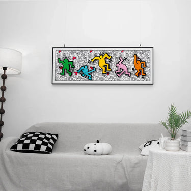Minimalist living room with white sofa, checkered pillow, soft toy, and colorful Keith Haring style artwork on wall