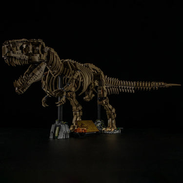 Detailed T-Rex dinosaur skeleton model made from brown building blocks displayed on black surface