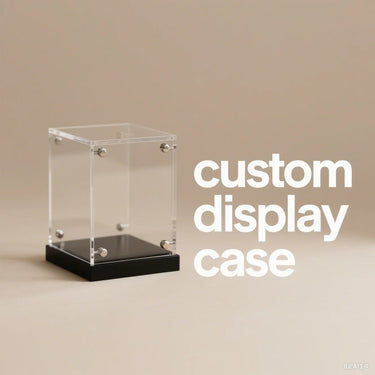 custom clear acrylic display case with black base on beige background