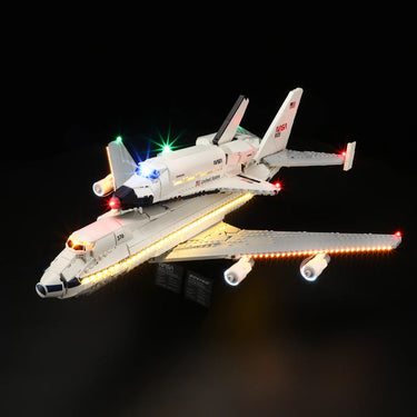 LEGO model of NASA Space Shuttle Enterprise atop a Boeing 747 Shuttle Carrier Aircraft with lights on